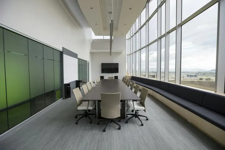 Bright commercial meeting floor with glass walls